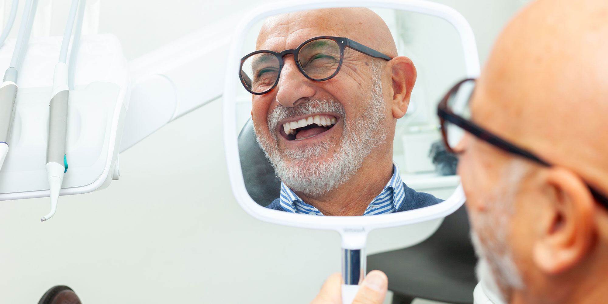 Patient Looking into mirror smiling